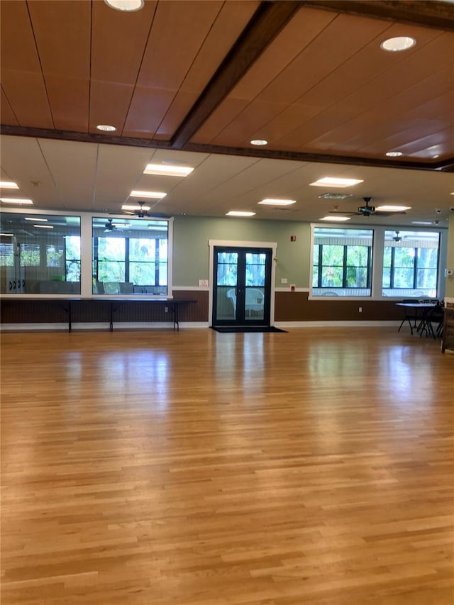 1657 Glengarry Dr, Palm Harbor, FL 34684 - workout area with light wood-style floors, ceiling fan, and a healthy amount of sunlight