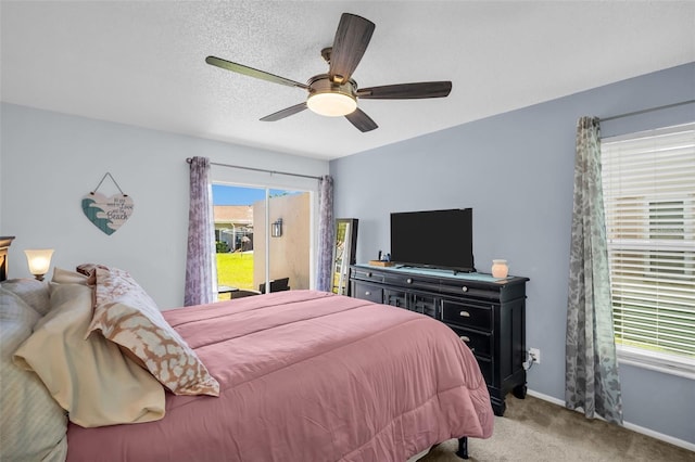 1657 Glengarry Dr, Palm Harbor, FL 34684 - bedroom featuring carpet flooring, access to exterior, and ceiling fan
