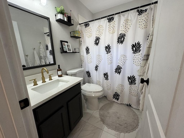 full bathroom featuring toilet, curtained shower, marble finish floor, and vanity