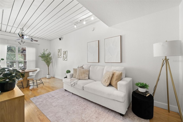 2410 W Azeele St Unit 228, Tampa, FL 33609 - living area featuring light wood-style floors and ceiling fan
