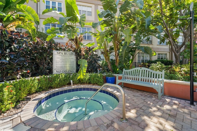 2410 W Azeele St Unit 228, Tampa, FL 33609 - view of pool with a hot tub