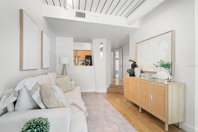 2410 W Azeele St Unit 228, Tampa, FL 33609 - living room with light wood-type flooring and baseboards