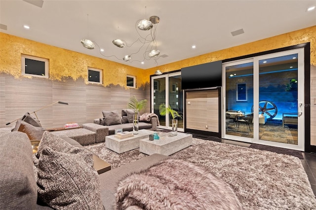 325 2nd St N, Saint Petersburg, FL 33701 - living room with an inviting chandelier, visible vents, and recessed lighting