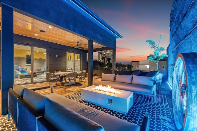 325 2nd St N, Saint Petersburg, FL 33701 - view of patio / terrace with ceiling fan, outdoor dining area, and an outdoor living space with a fire pit