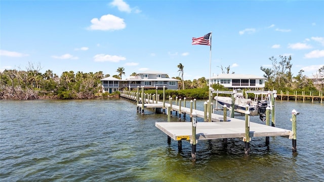 9048 Wharf Ave, Placida, FL 33946 - view of dock with boat lift and a water view