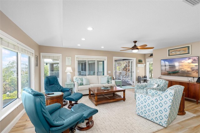 9048 Wharf Ave, Placida, FL 33946 - living room featuring recessed lighting, light wood-style flooring, visible vents, and ceiling fan
