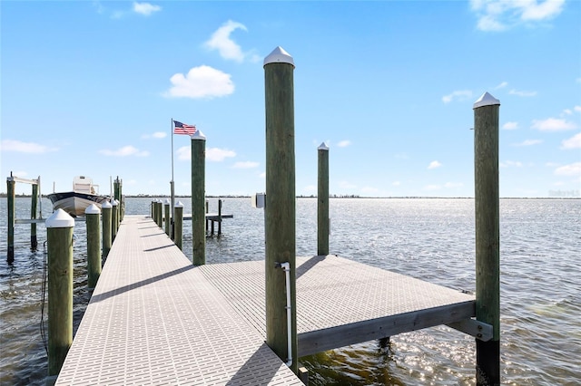 9048 Wharf Ave, Placida, FL 33946 - view of dock featuring a water view and boat lift