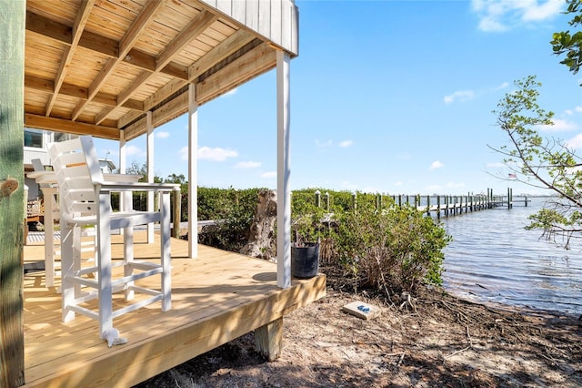 9048 Wharf Ave, Placida, FL 33946 - wooden deck with a water view