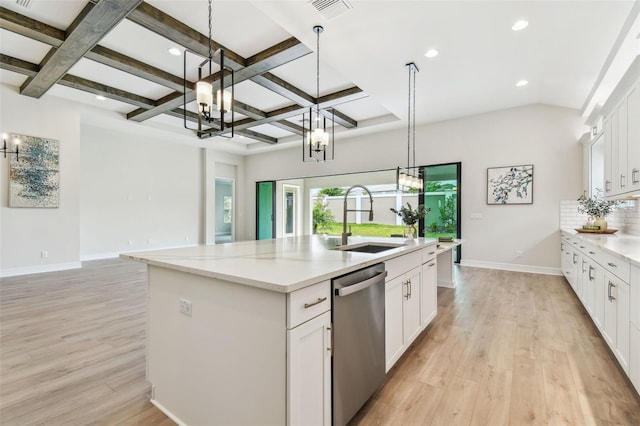 kitchen with a sink, stainless steel dishwasher, a notable chandelier, and visible vents