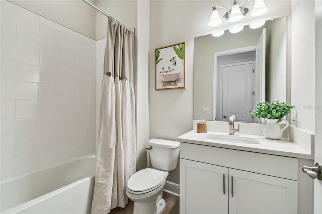 full bath with vanity, baseboards, toilet, shower / bathtub combination with curtain, and wood finished floors