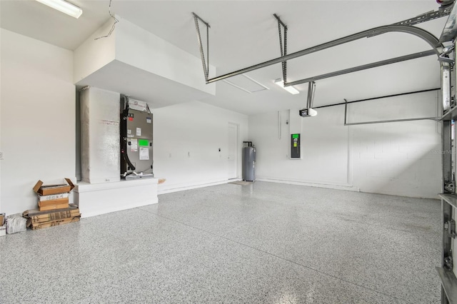 garage with heating unit, electric panel, and water heater