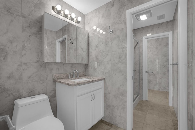 3506 Seaway Dr, New Port Richey, FL 34652 - bathroom with toilet, tile walls, a stall shower, and vanity