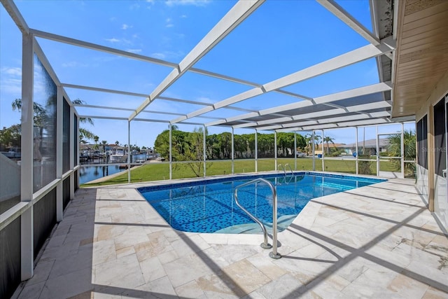 3506 Seaway Dr, New Port Richey, FL 34652 - outdoor pool with a water view, a patio area, glass enclosure, and a lawn