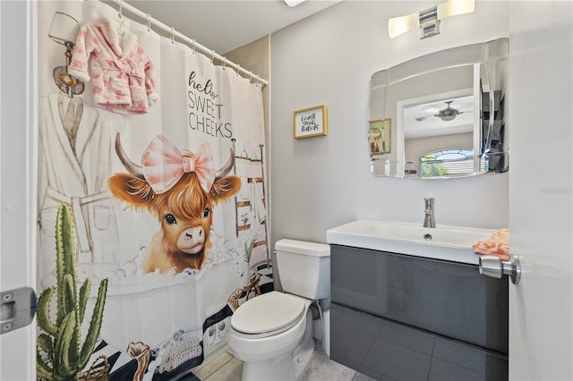 14910 Par Club Cir, Tampa, FL 33618 - bathroom with toilet, tile patterned floors, vanity, and a shower with curtain