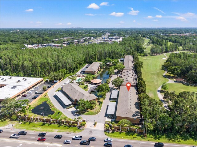 14910 Par Club Cir, Tampa, FL 33618 - drone / aerial view with a wooded view