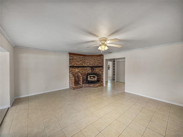 unfurnished living room with light tile patterned flooring, crown molding, ceiling fan, and baseboards