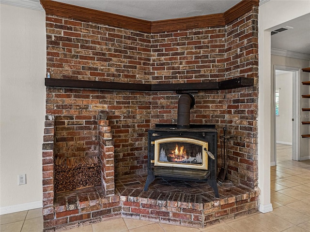room details with a wood stove, visible vents, baseboards, and ornamental molding