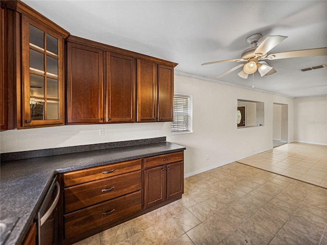 kitchen with ceiling fan, glass insert cabinets, visible vents, dishwasher, and dark countertops