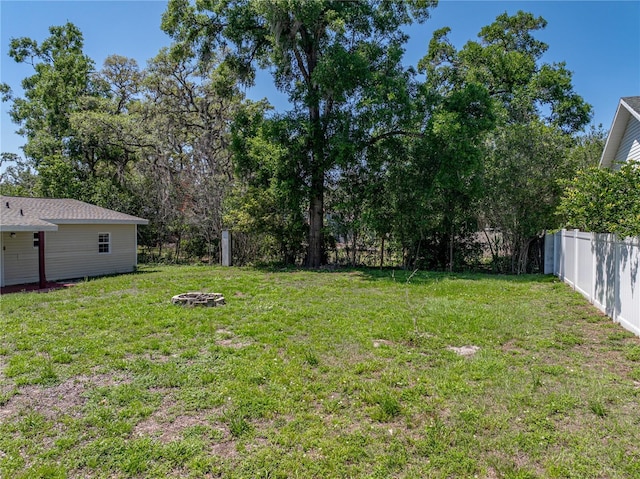 view of yard with fence