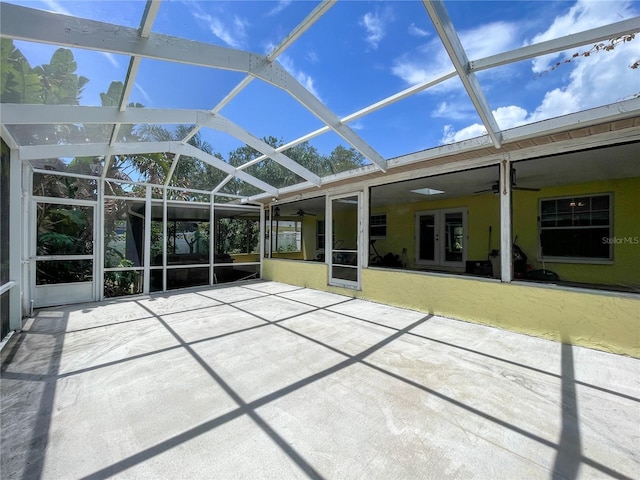 3647 Lake St, George Drive, Palm Harbor, FL 34684 - unfurnished sunroom with a ceiling fan and french doors