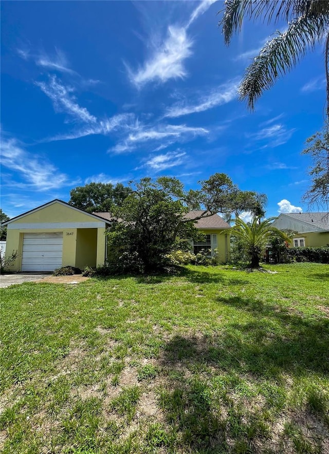 3647 Lake St, George Drive, Palm Harbor, FL 34684 - view of green lawn featuring driveway
