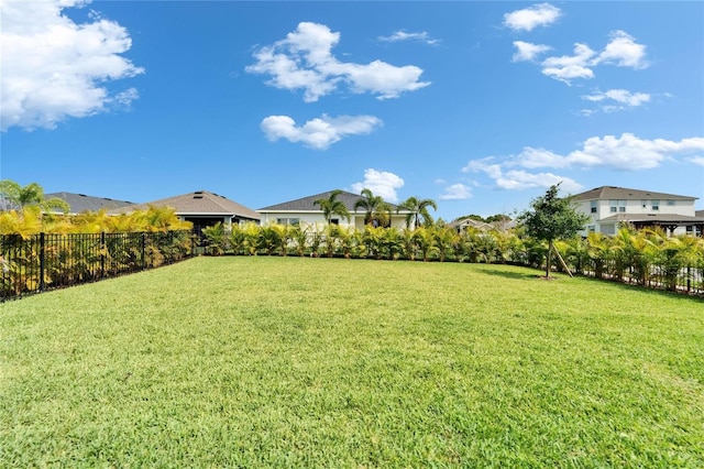 view of yard with fence