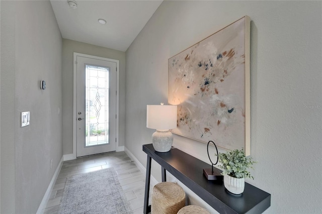 doorway with baseboards