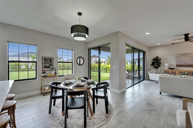 dining room featuring ceiling fan, baseboards, wood tiled floor, and recessed lighting