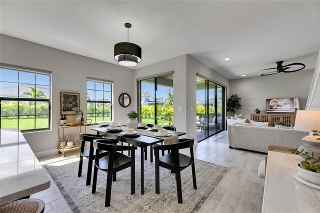 5601 Limelight Dr, Apollo Beach, FL 33572 - dining area with a ceiling fan and recessed lighting