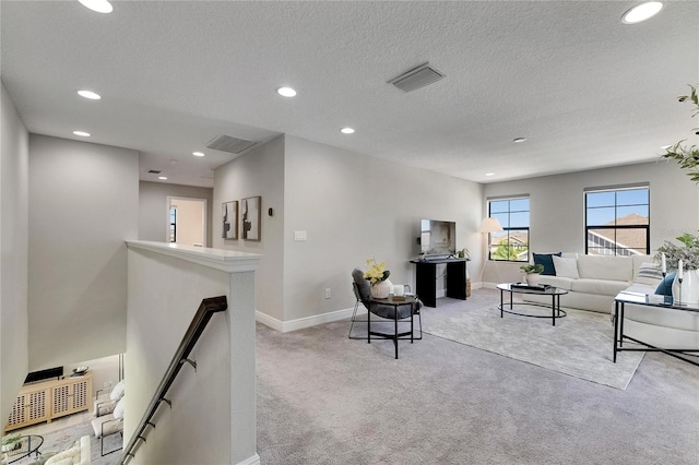 5601 Limelight Dr, Apollo Beach, FL 33572 - living room with carpet flooring, recessed lighting, and a textured ceiling