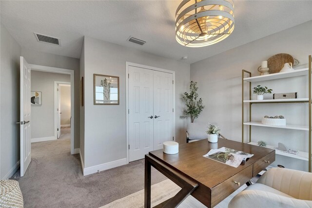 5601 Limelight Dr, Apollo Beach, FL 33572 - home office featuring carpet floors and a chandelier