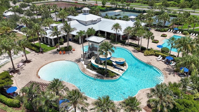 5601 Limelight Dr, Apollo Beach, FL 33572 - community pool with a water slide and a patio area