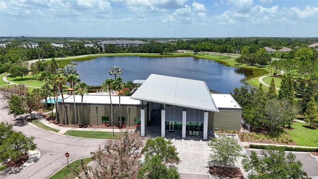 5601 Limelight Dr, Apollo Beach, FL 33572 - drone / aerial view of a large body of water and a tree filled landscape