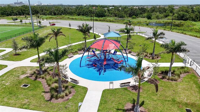 5601 Limelight Dr, Apollo Beach, FL 33572 - view of swimming pool featuring a lawn