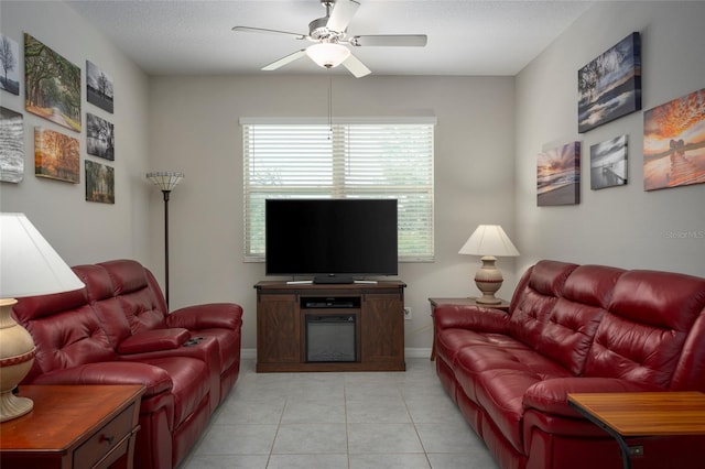 11704 Castine St, New Port Richey, FL 34654 - living area with baseboards, ceiling fan, and light tile patterned flooring