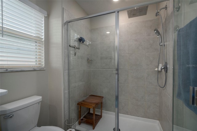 11704 Castine St, New Port Richey, FL 34654 - bathroom featuring a stall shower, toilet, and visible vents