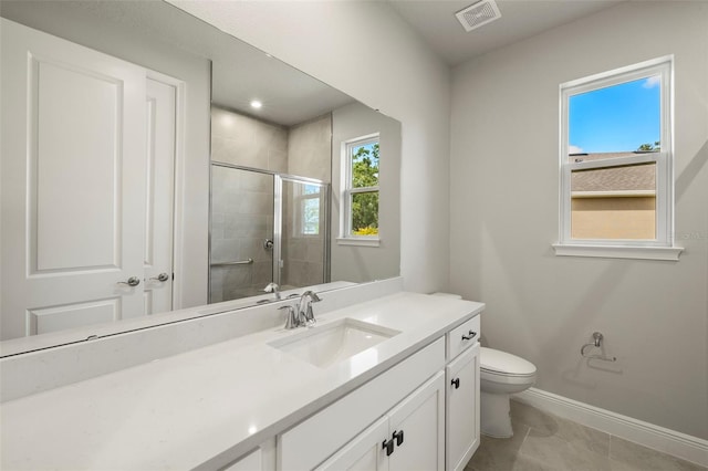 full bath with visible vents, vanity, toilet, baseboards, and a shower stall