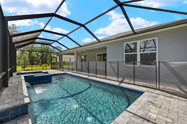 outdoor pool featuring a patio, a hot tub, and a lanai