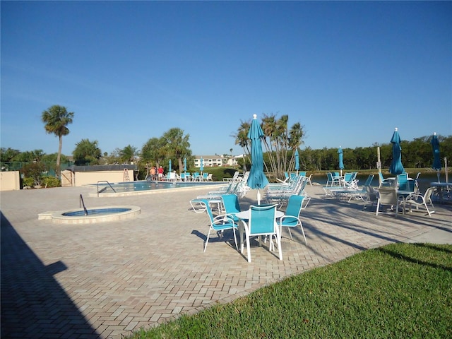 10034 64th Ave N Unit 21, Saint Petersburg, FL 33708 - exterior space with a community pool