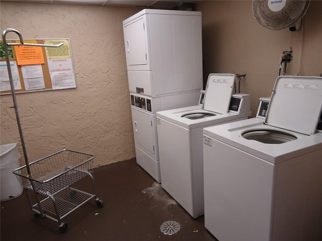 10034 64th Ave N Unit 21, Saint Petersburg, FL 33708 - common laundry area with a textured wall, washing machine and dryer, and stacked washer / drying machine