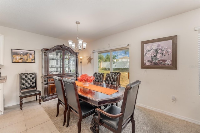 5597 Forest Ridge Dr, Winter Haven, FL 33881 - dining space with a chandelier, baseboards, and light tile patterned floors
