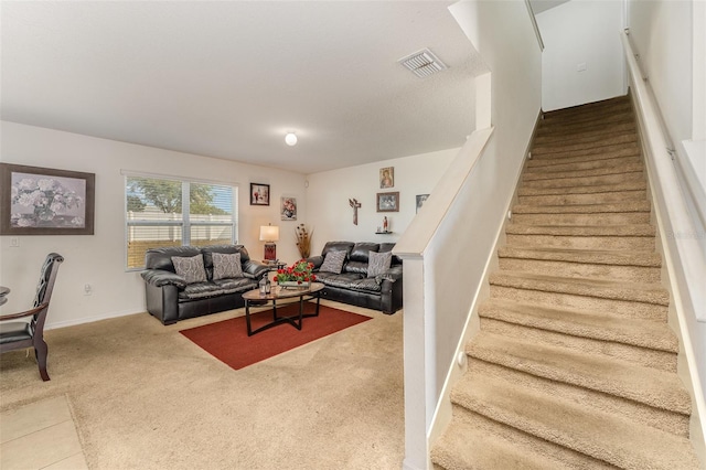5597 Forest Ridge Dr, Winter Haven, FL 33881 - carpeted living area with stairway