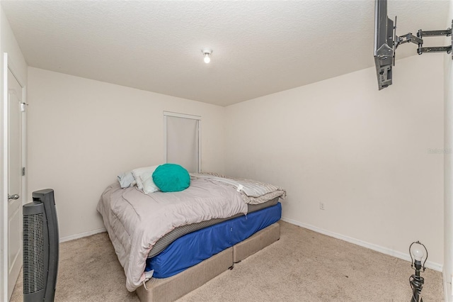 5597 Forest Ridge Dr, Winter Haven, FL 33881 - carpeted bedroom featuring baseboards