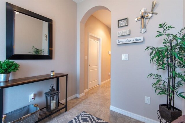 10425 Yellow Spice Ct, Riverview, FL 33578 - hall with arched walkways and baseboards