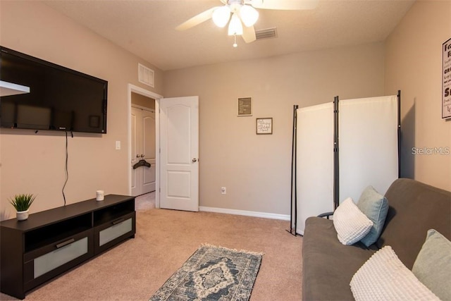 10425 Yellow Spice Ct, Riverview, FL 33578 - living room with light carpet, visible vents, baseboards, and ceiling fan