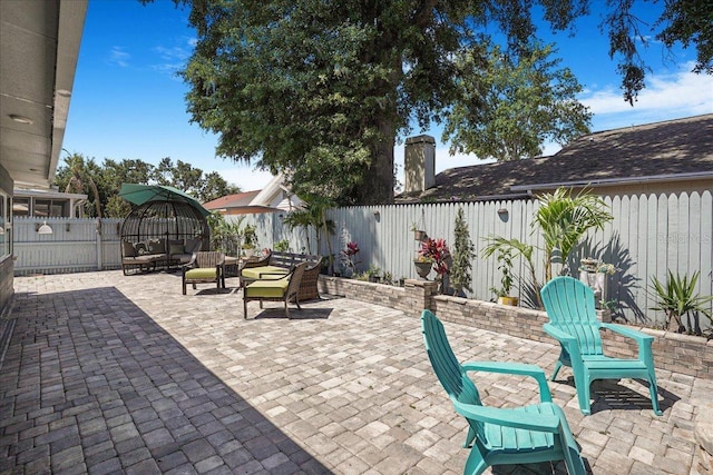 13215 Beechberry Dr, Riverview, FL 33579 - view of patio / terrace with an outdoor hangout area and a fenced backyard