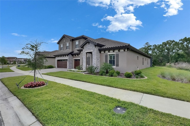 view of front facade with an attached garage, driveway, stone siding, and stucco siding