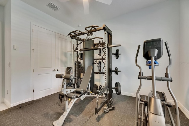 workout area with baseboards, ceiling fan, and visible vents