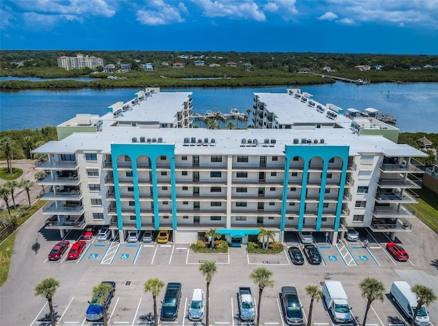 drone / aerial view with a water view