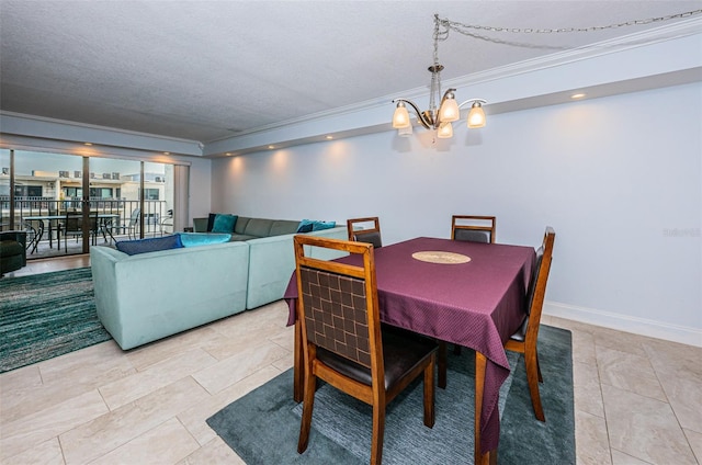 tiled dining area with a textured ceiling, a notable chandelier, ornamental molding, and baseboards